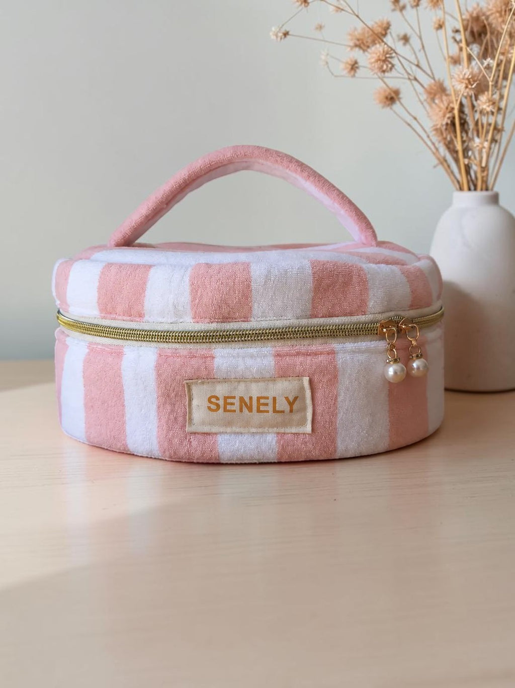 Vanity rond aux rayures roses et blanches